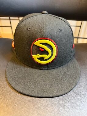 New Era Black Snapback Hat with Yellow & Red Hawk Emblem